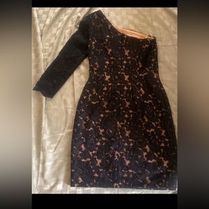 Marcheda note lace mini dress. Size 4. New without tags.